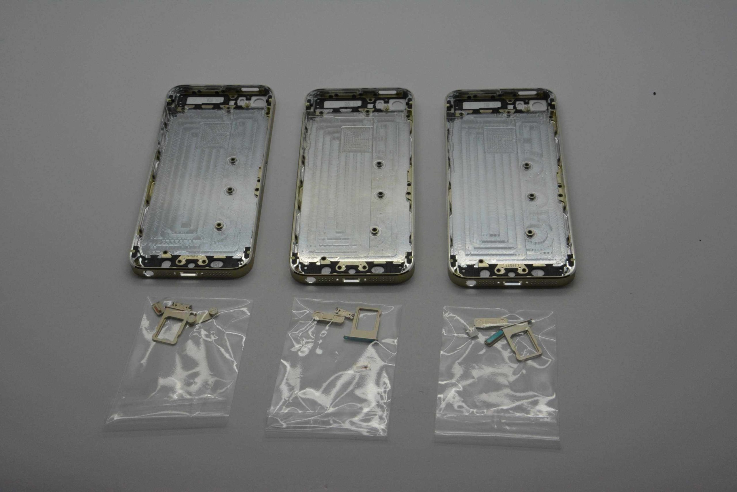 three smartphone backs with accessories