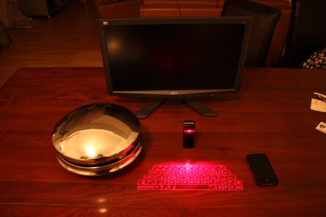 desk setup with laser keyboard