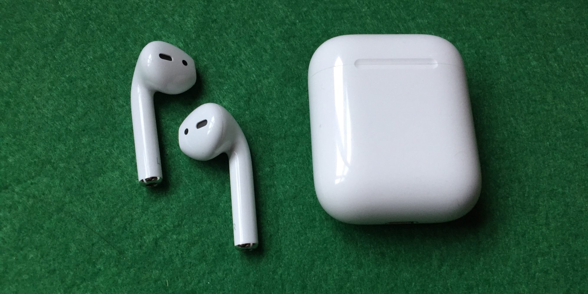 airpods box on green