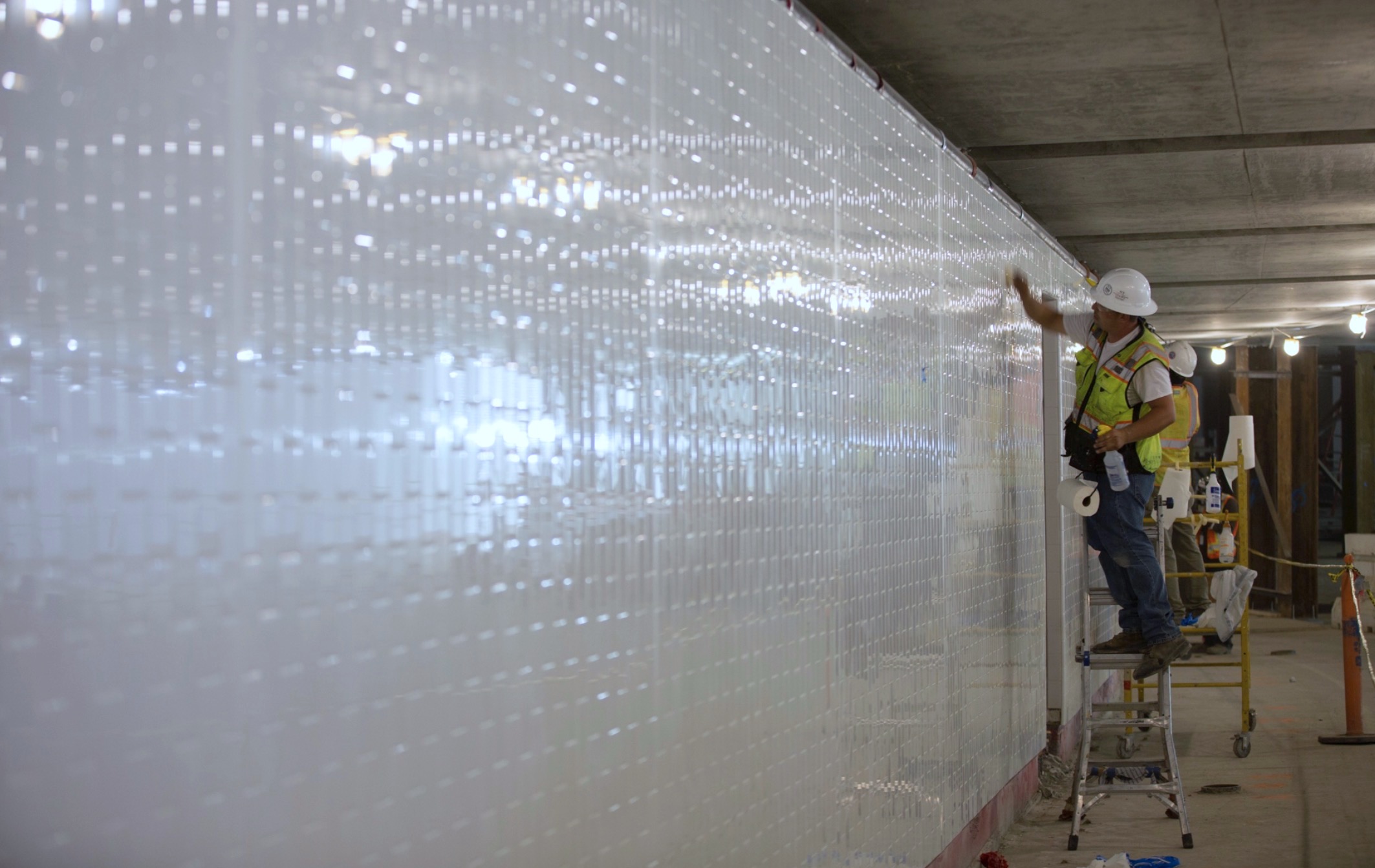 worker polishing wall