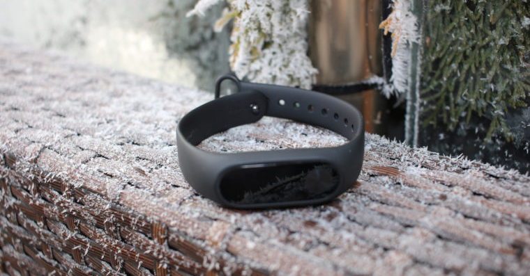 smartwatch on icy wood