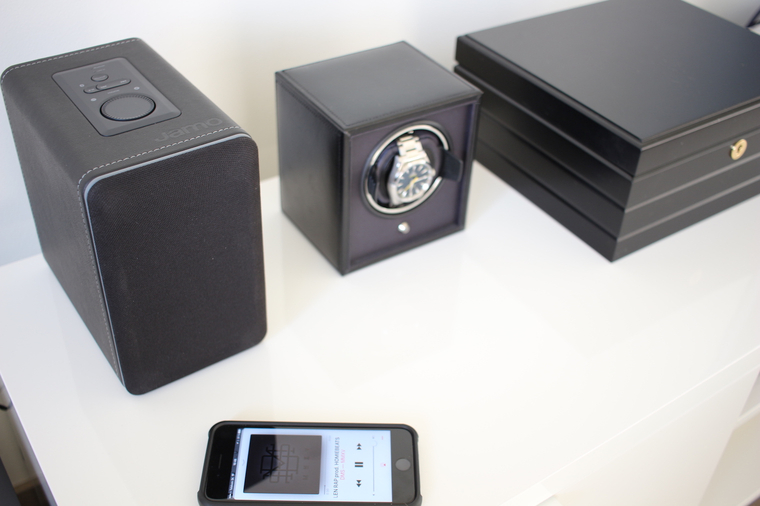 speaker watch boxes on table