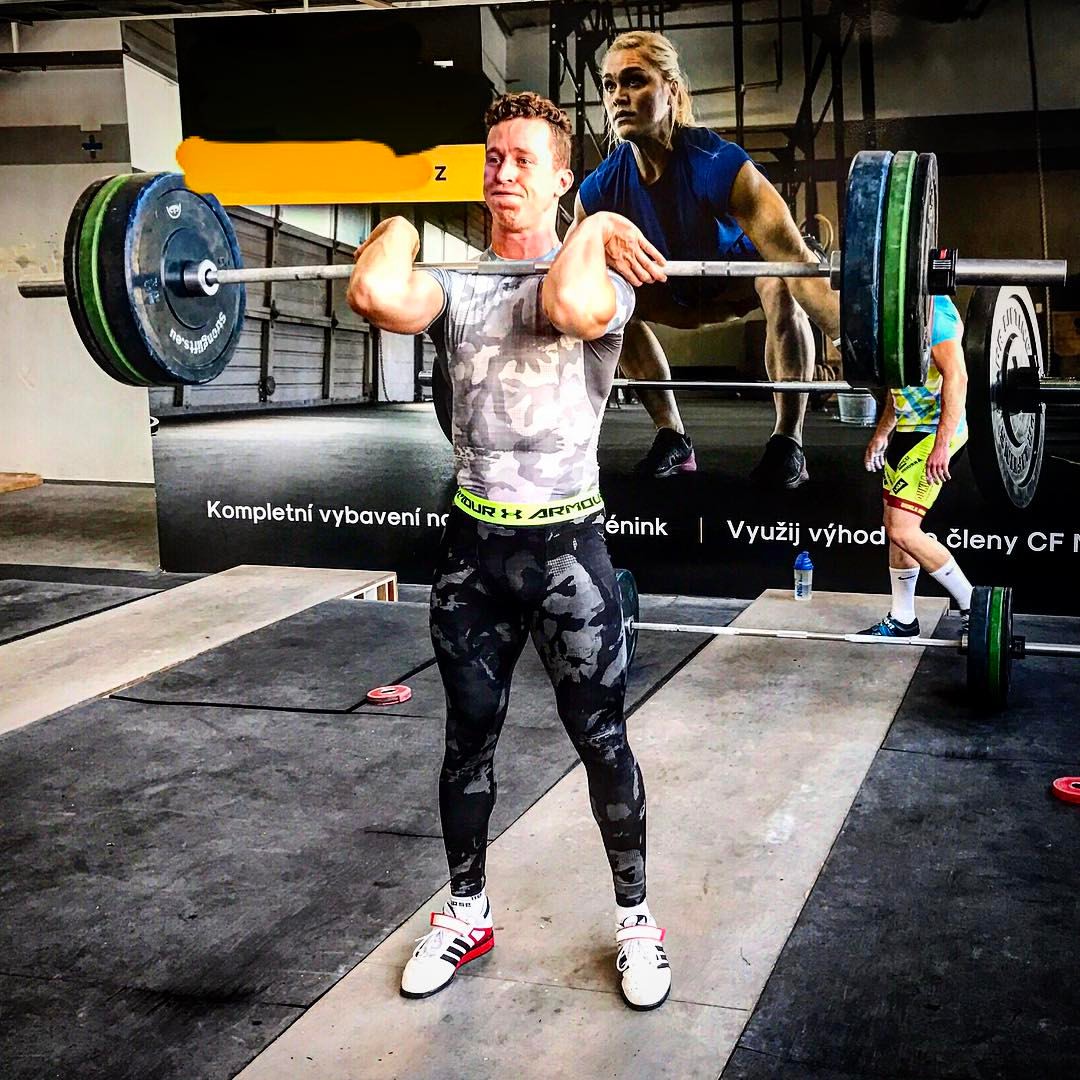 athlete lifting weights