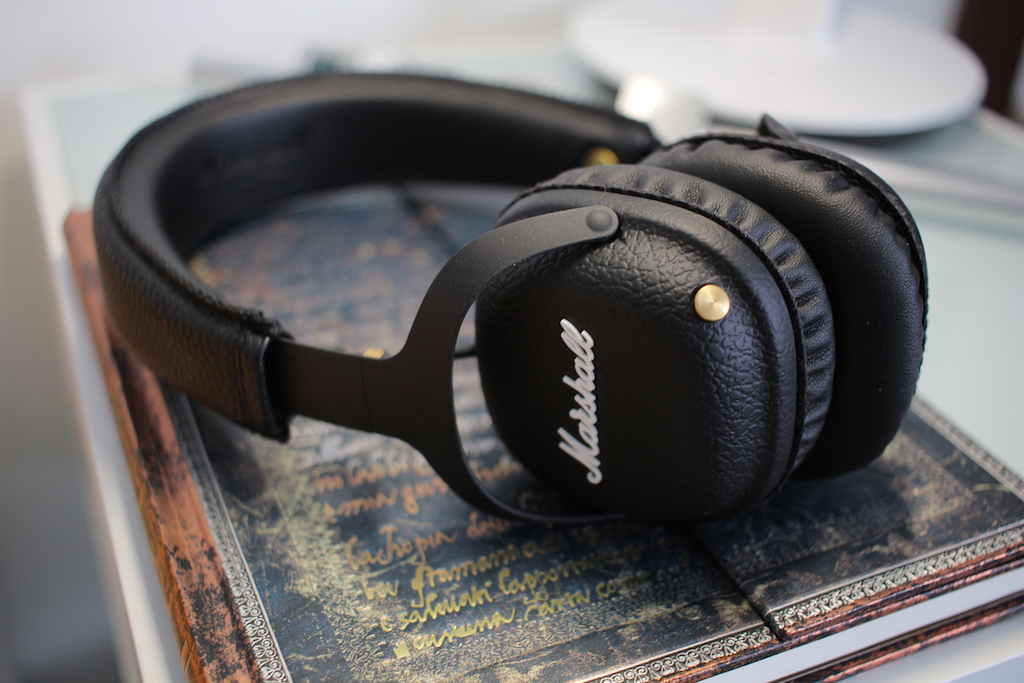 black headphones on book angle view