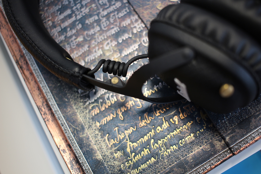 black headphones on book angled