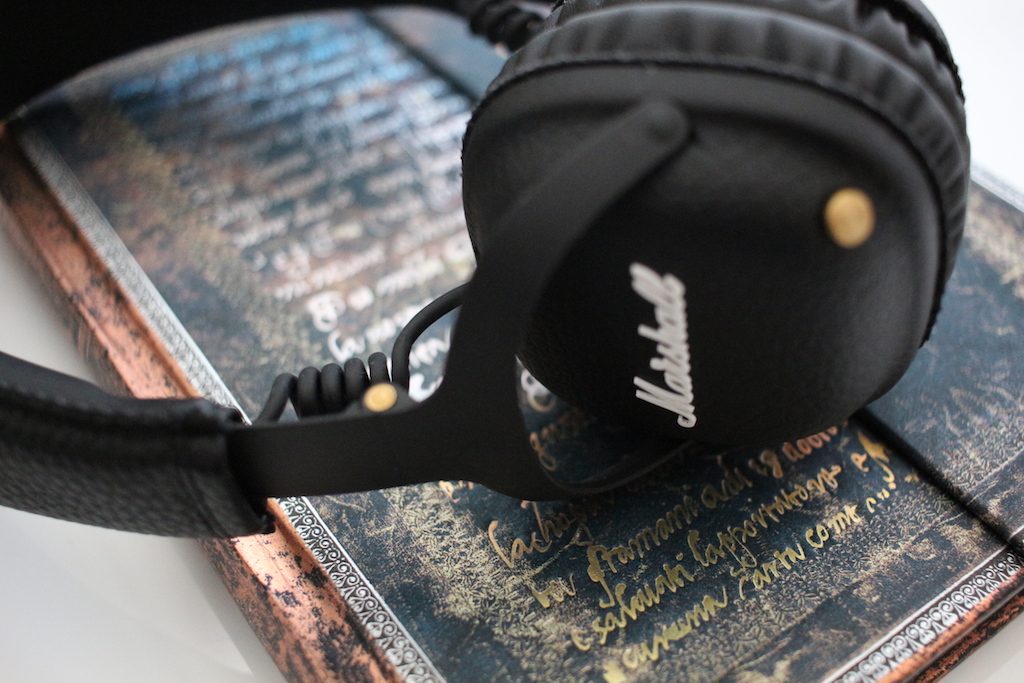 black headphones on book closeup