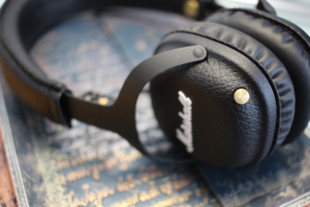 black headphones on book focus