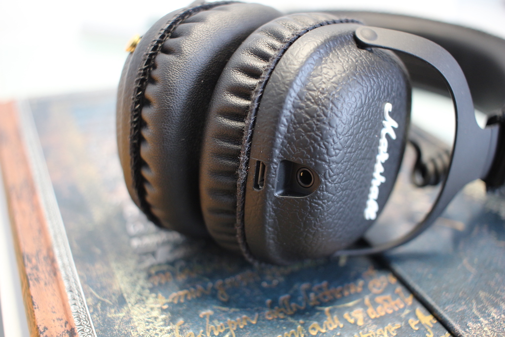 black headphones on book side closeup