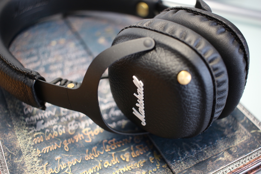 black headphones on book top view