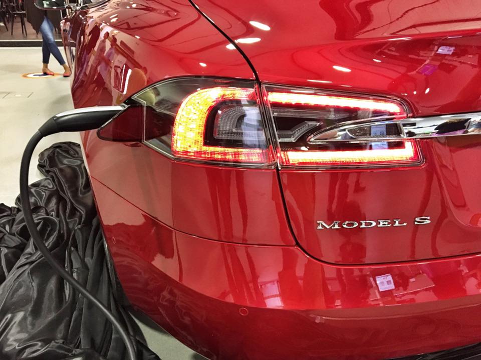 red tesla model s charging