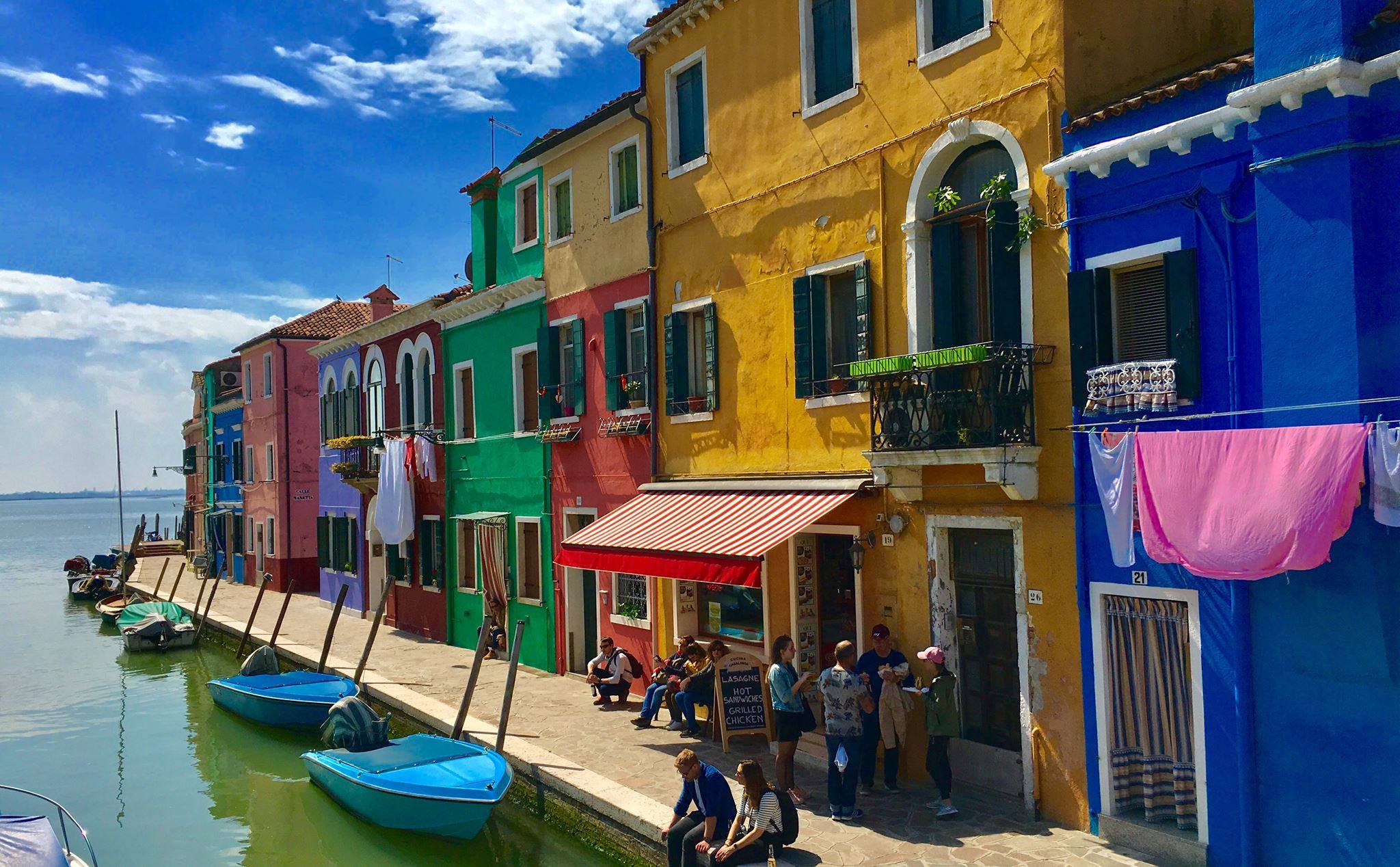 colorful buildings by canal