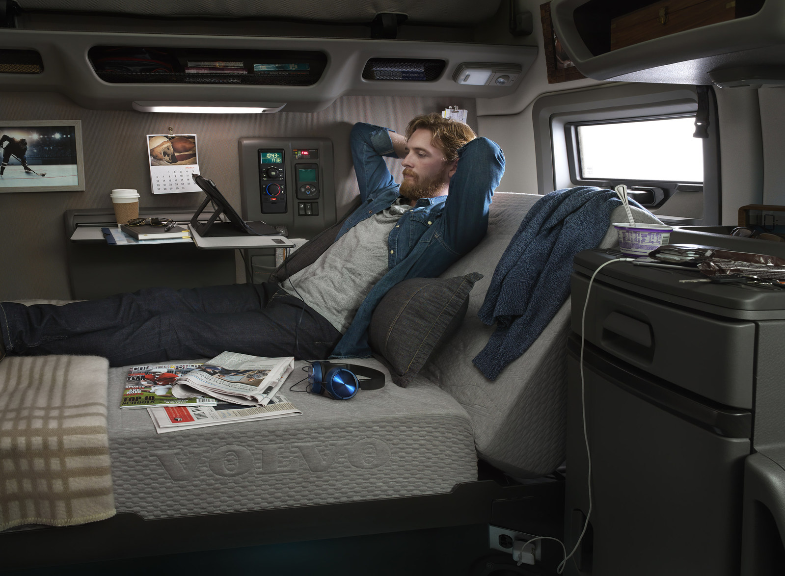 person relaxing in truck cabin