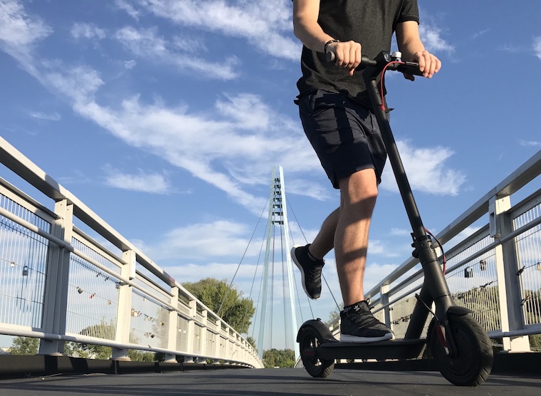 person riding electric scooter