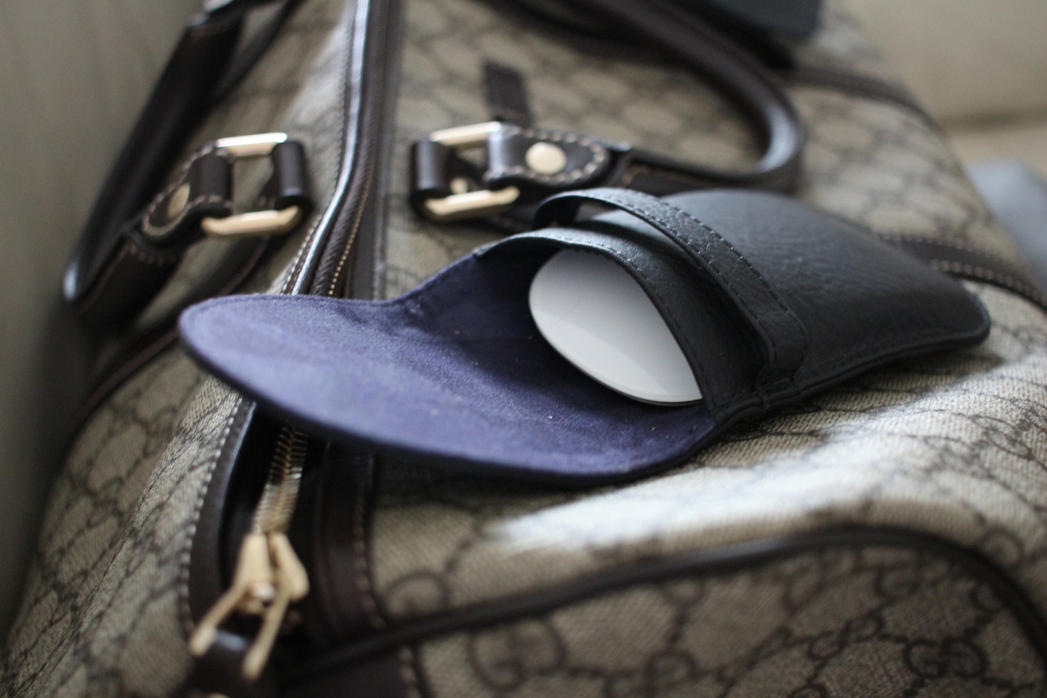 black leather case open on bag