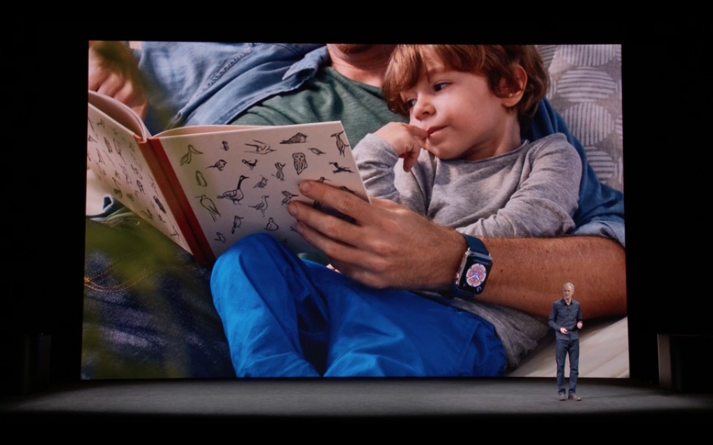 child reading with apple watch