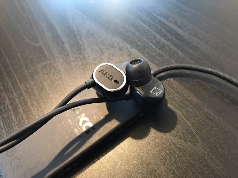 akg earbuds on table