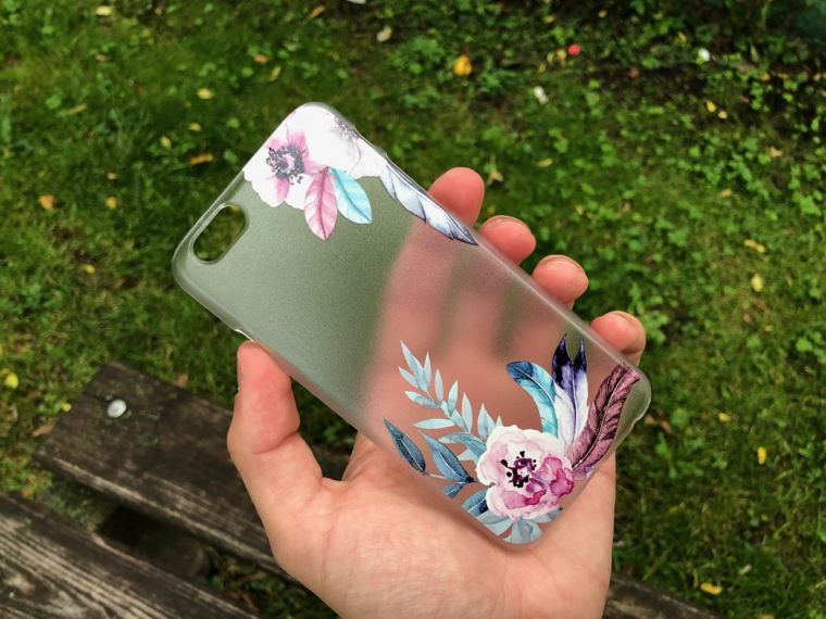 hand holding floral phone case