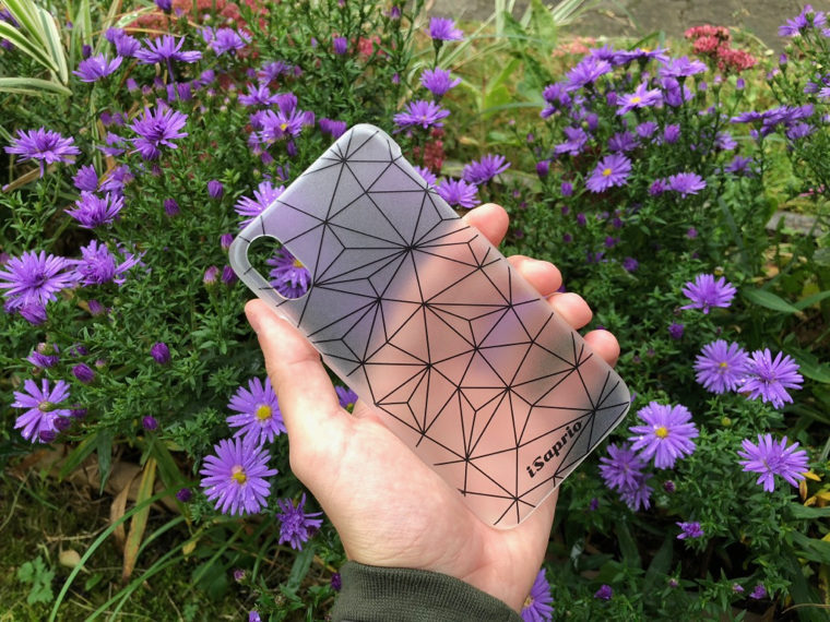 hand holding geometric phone case flowers