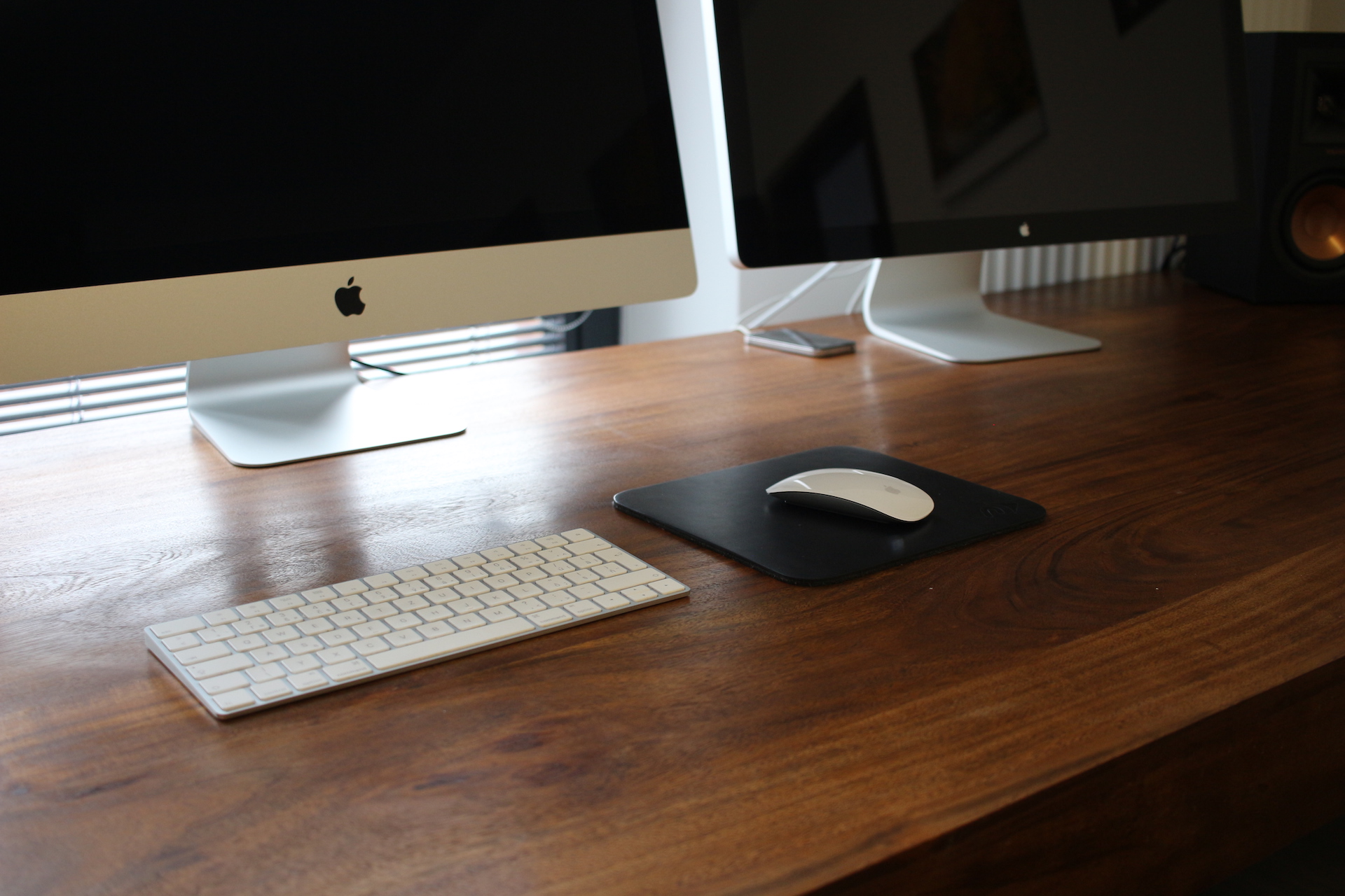 imac keyboard and mouse on desk