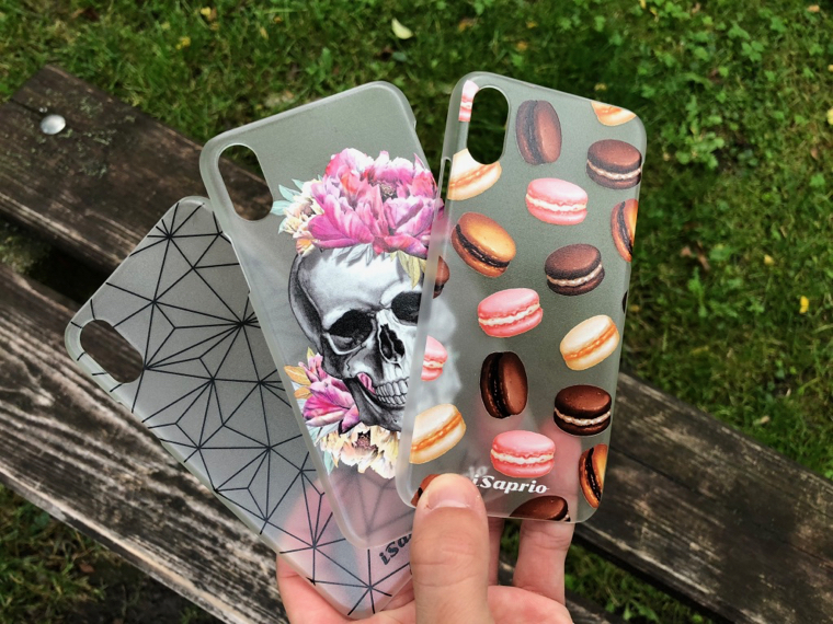 variety phone cases on bench closeup