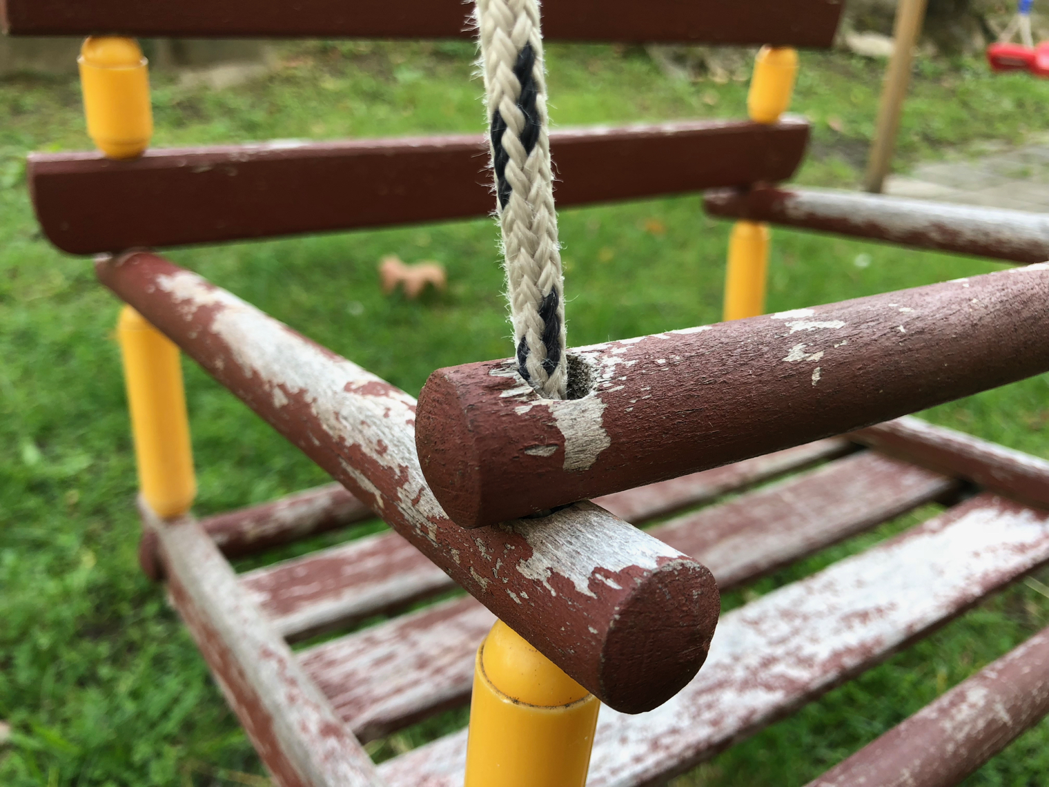 closeup of wooden swing