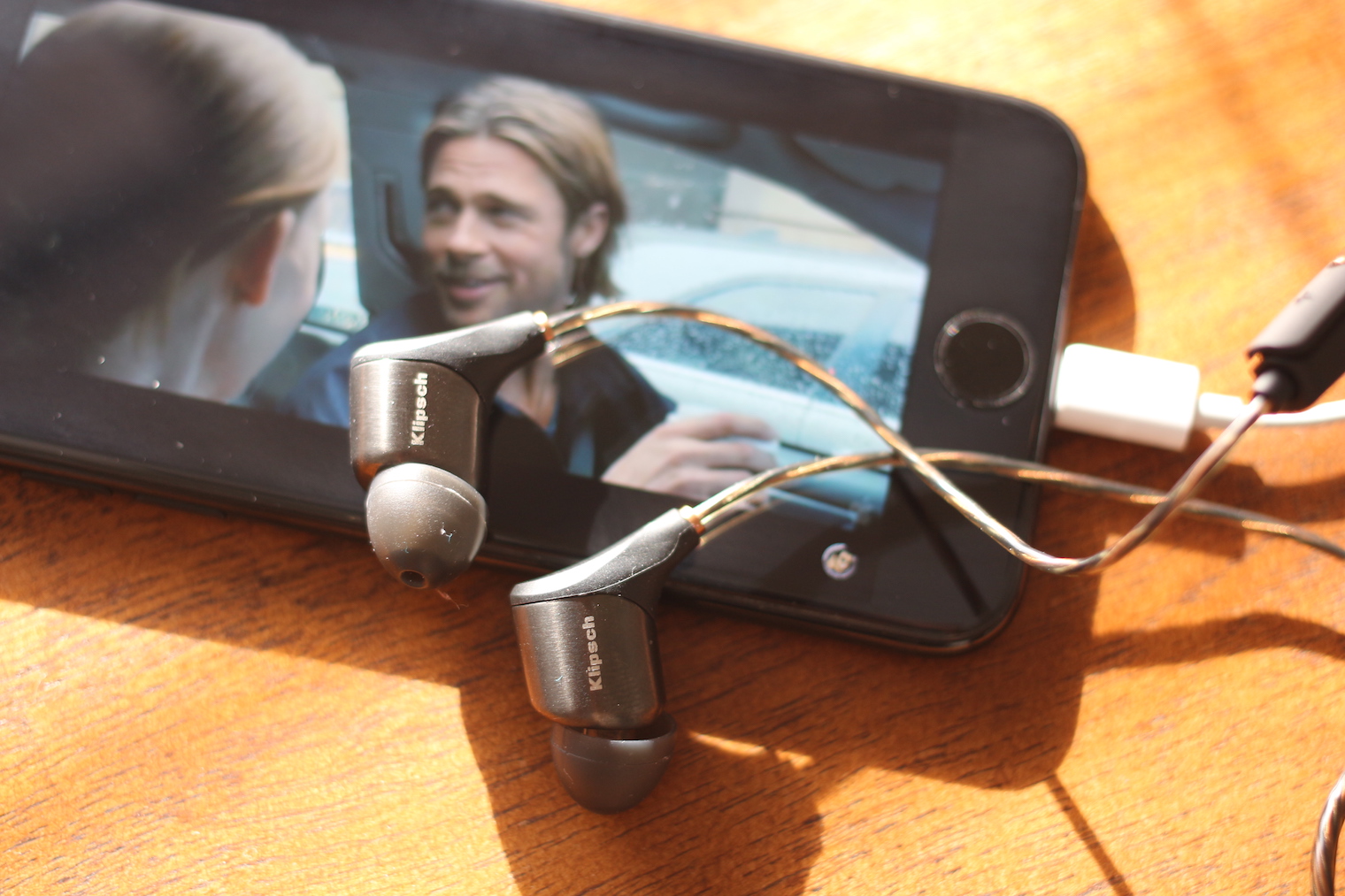 earbuds and smartphone