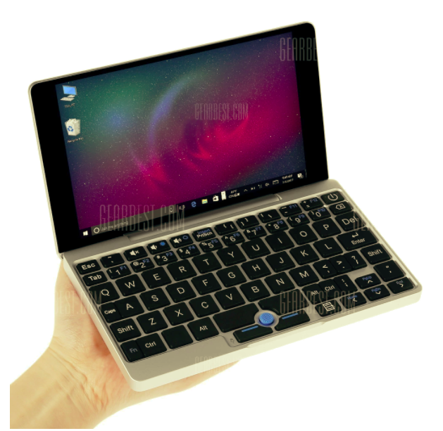 hand holding mini laptop