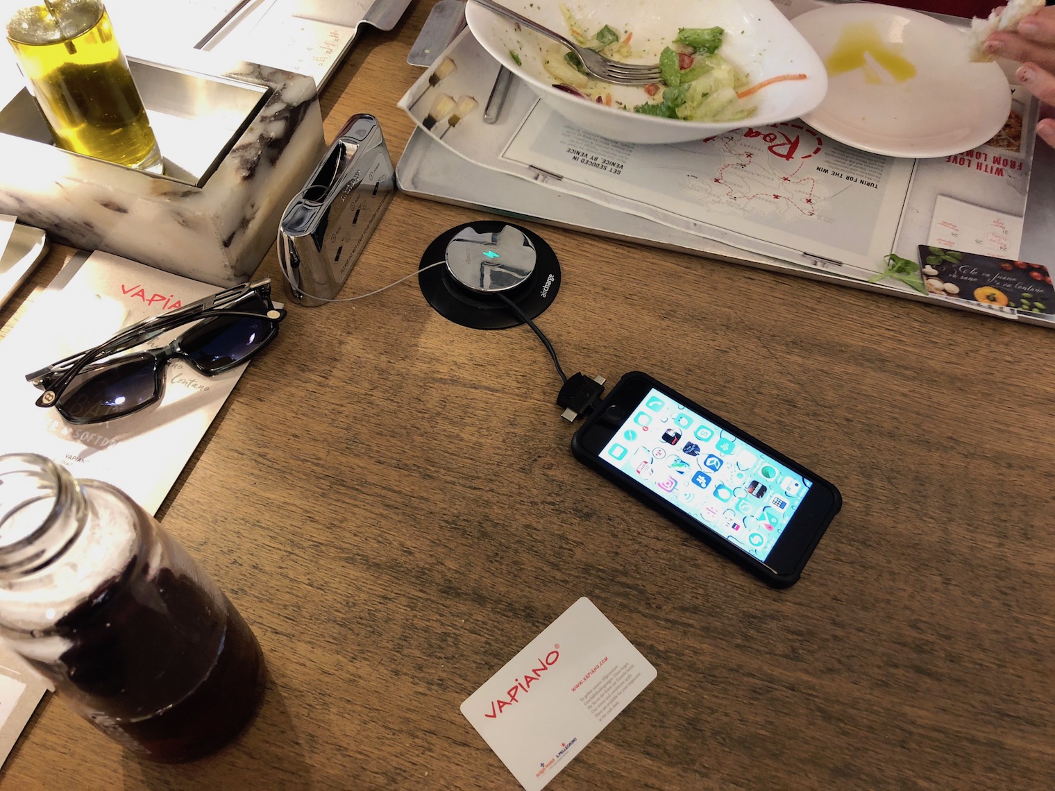 phone and salad on table