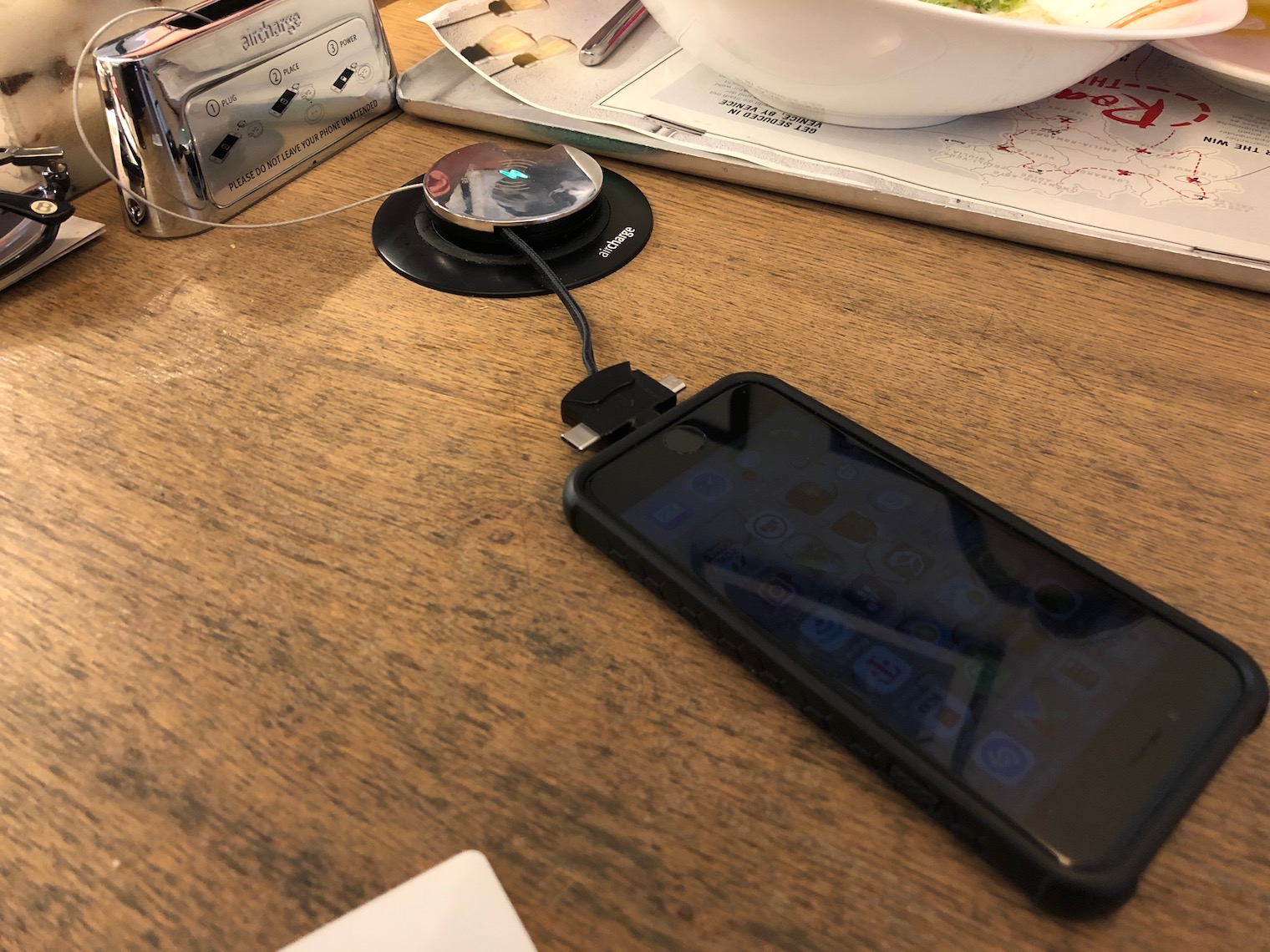 phone charging on table