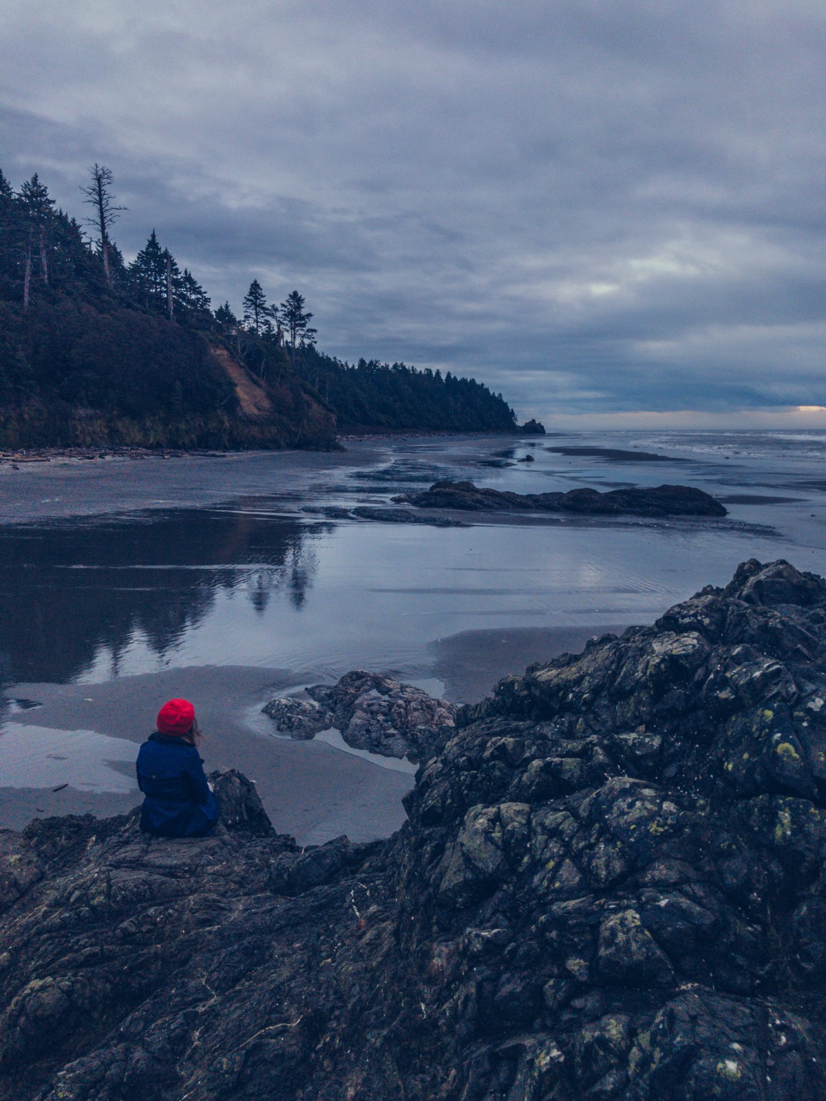 child on rocky beach edited