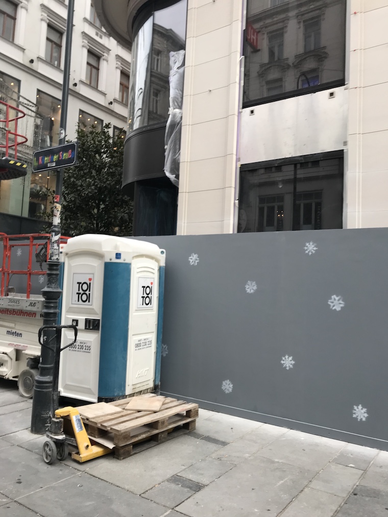 construction site with portable toilets