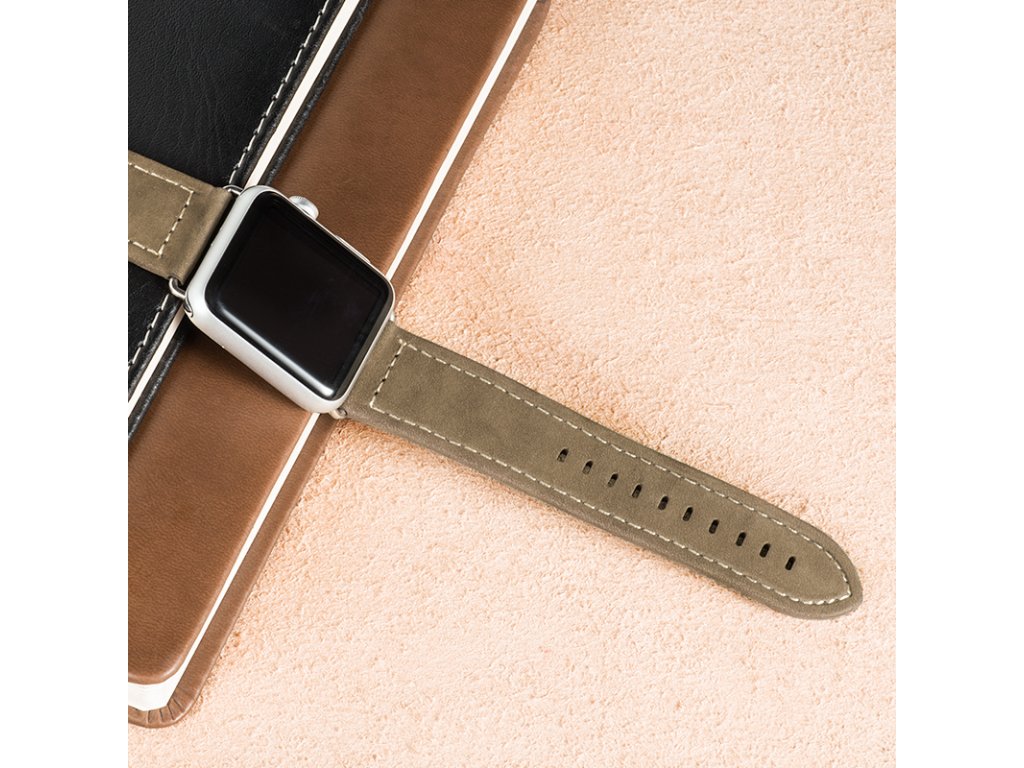 smartwatch on notebook top view