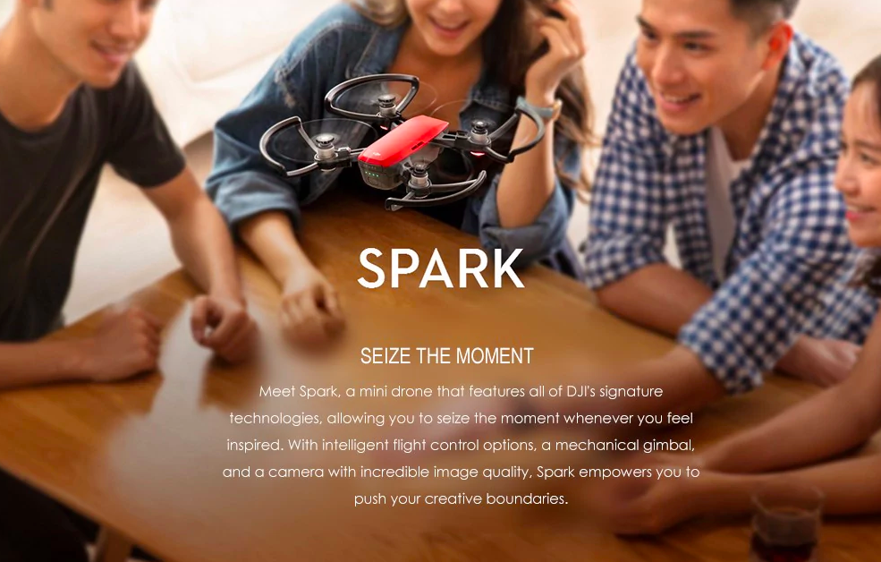 group with drone on table