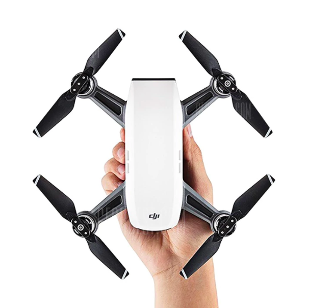 hand holding white drone