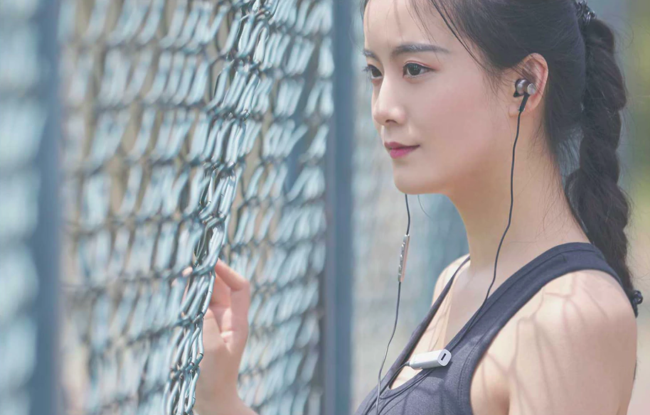 woman wearing earphones