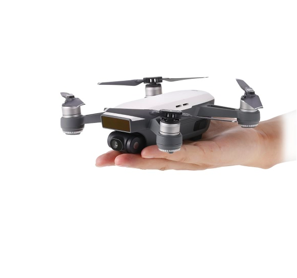 dji spark drone on hand