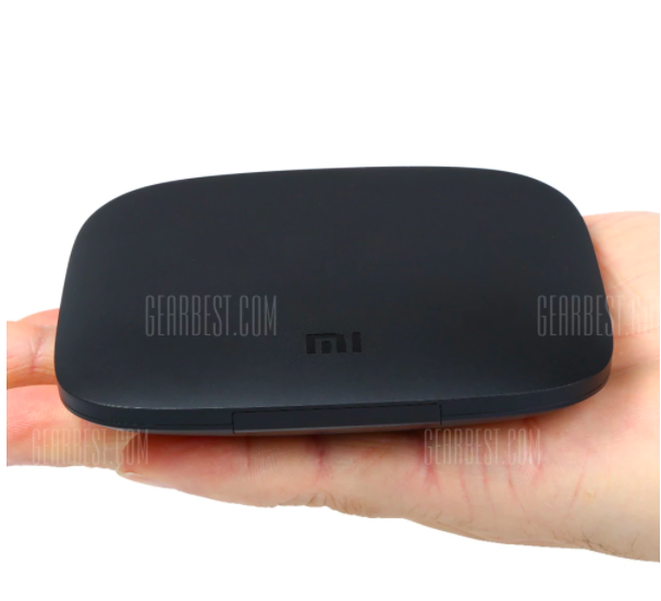 hand holding mi tv box