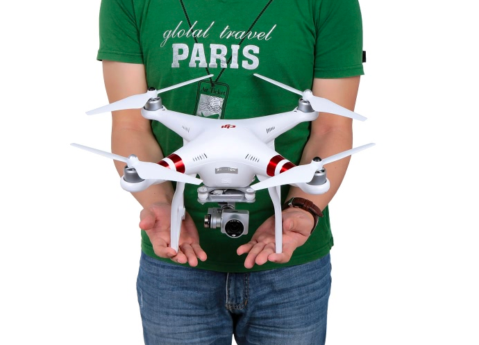 person holding drone