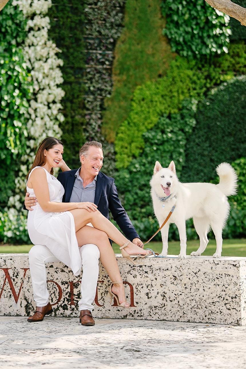 couple with dog outdoors