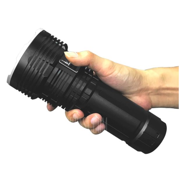 hand holding flashlight
