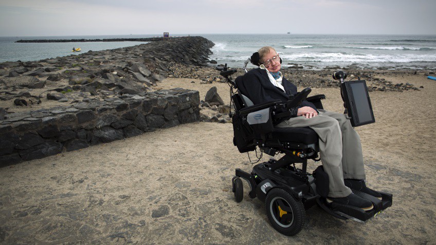 person wheelchair beach