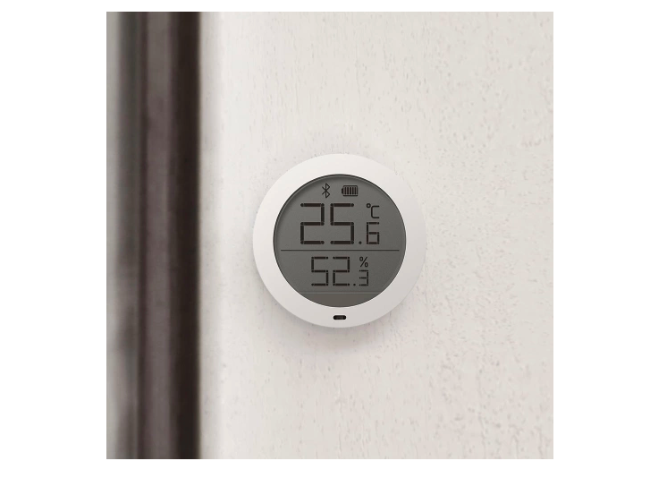 round digital thermometer on wall