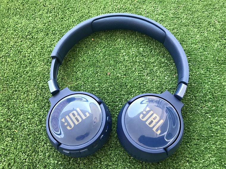 blue headphones on grass