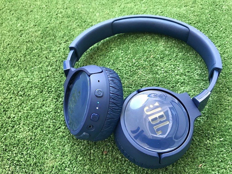 blue headphones on lawn