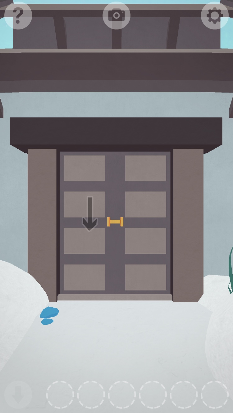 closed wooden door snowy path