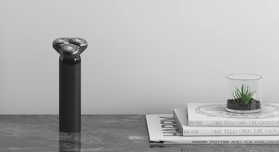 electric shaver on marble table