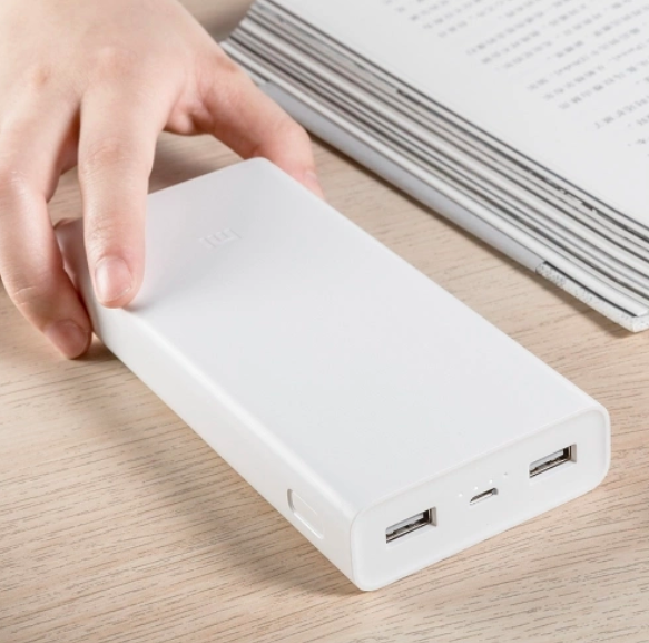 hand holding xiaomi power bank
