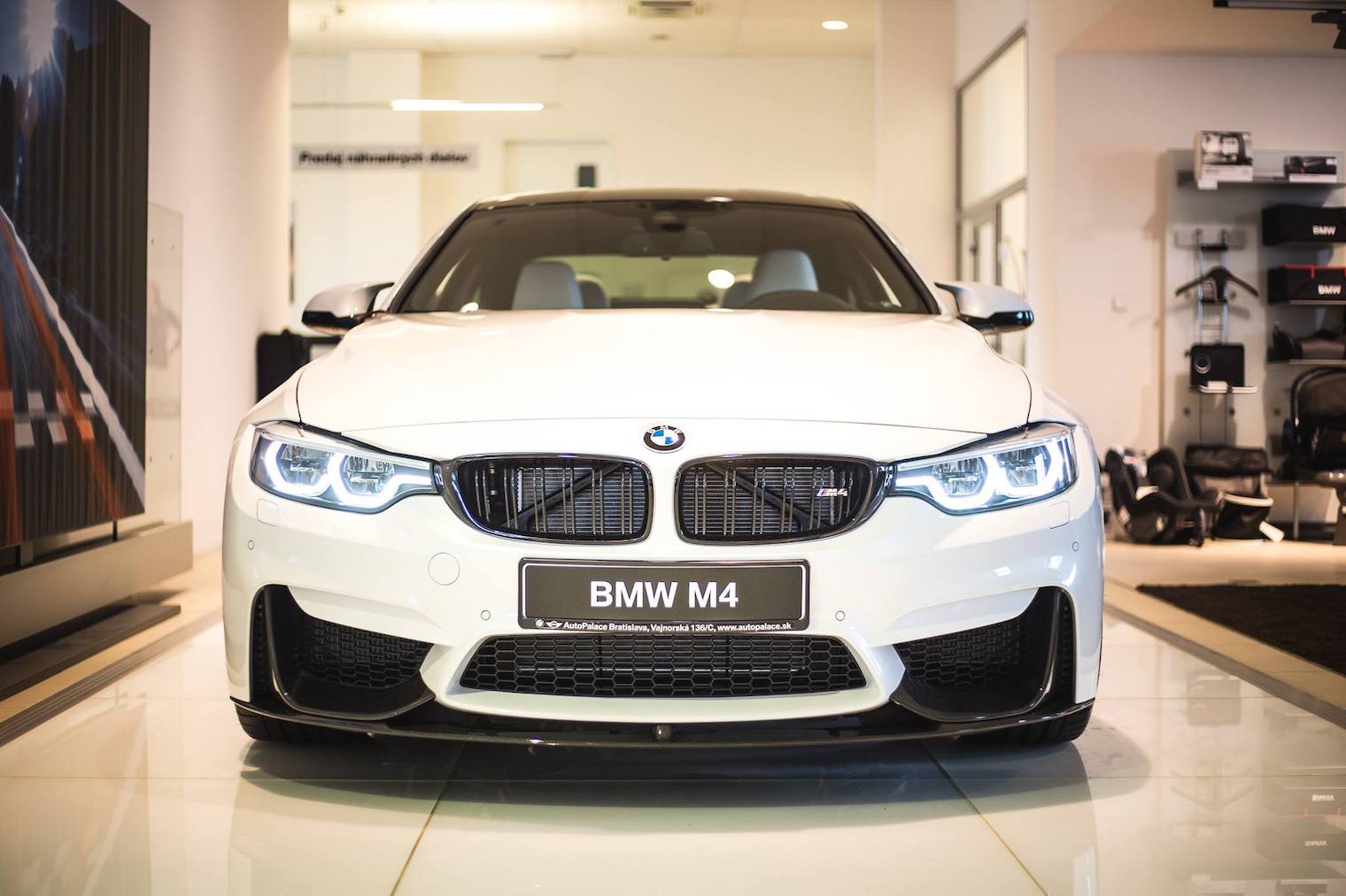 white bmw m4 front