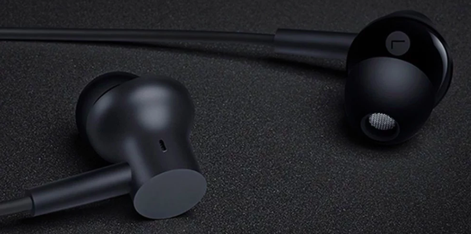 black earbuds on surface