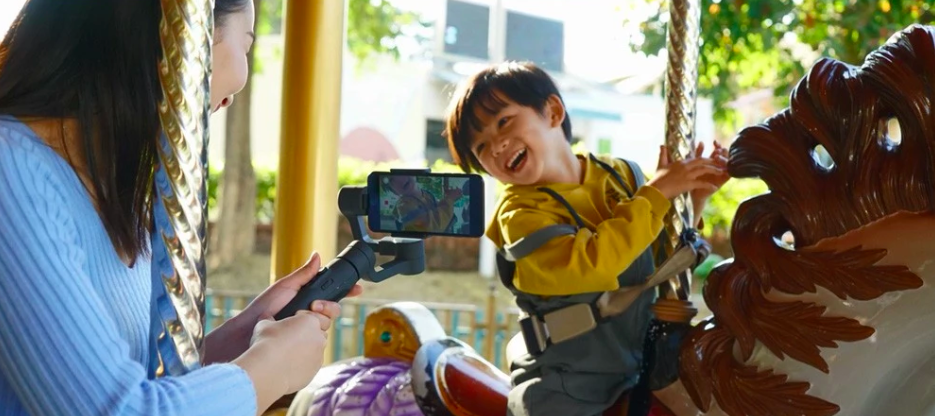 child on carousel with gimbal